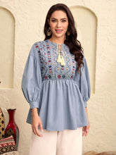 Modely Floral Embroidery Tassel Tie Neck Lantern Sleeve Peplum Blouse